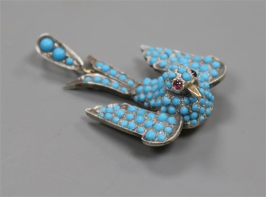 A late Victorian white and yellow metal, turquoise set swallow pendant with cabochon eyes, overall 41mm.